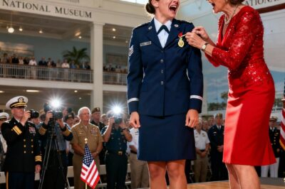 At the military charity gala, my stepmom grabbed the gold brooch on my dress. “You stole this!” she hissed. “you’re too poor to wear that!” she tried to rip it off. A veteran grabbed her wrist. “Lady… That is the medal of Honor.” “Do you not know who she is?” my stepmom went pale.